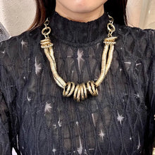 Vintage Gold Statement Necklace – Articulated Tube Segments with Black Glass Bead Centre