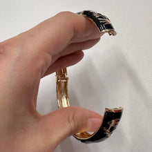 Vintage Black Enamel Floral Hinge Bangle | Gold-Tone Botanical Bracelet | Elegant Statement Jewelry