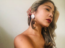 Rose gold oversized swirly earrings